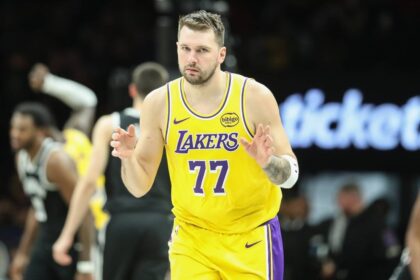 Brooklyn, New York, USA; Los Angeles Lakers guard Luka Doncic (77) gestures after scoring in the third quarter against the Brooklyn Nets at Barclays Center. Mandatory Credit: Wendell Cruz-Imagn Images