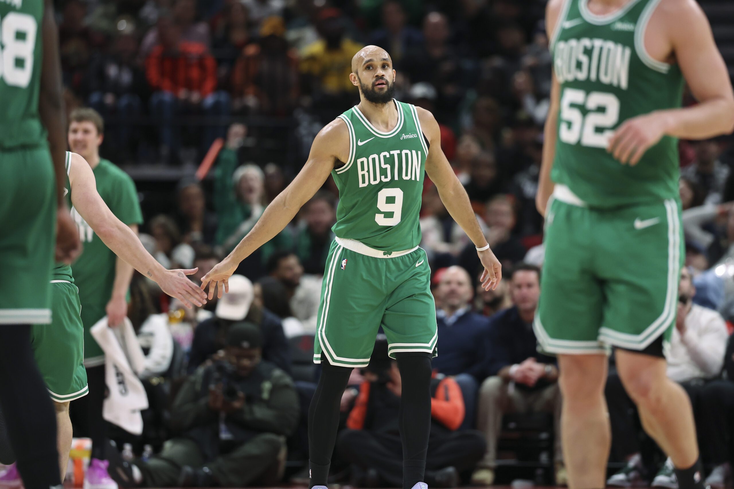 Feb 4, 2026; Houston, Texas, USA; Boston Celtics guard Derrick White (9) reacts after a play during the third quarter against the Houston Rockets at Toyota Center. Mandatory Credit: Troy Taormina-Imagn Images