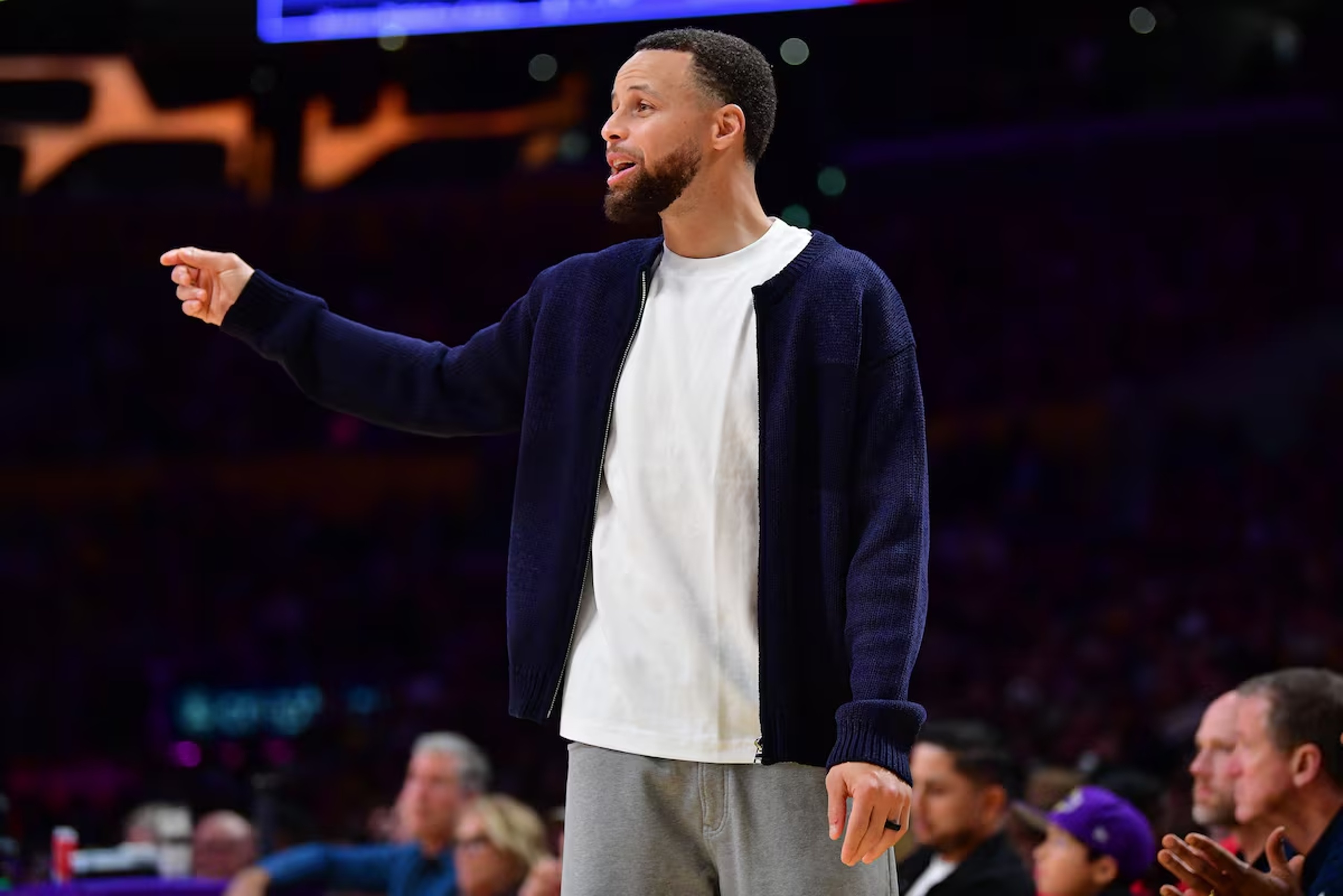 Feb 7, 2026; Los Angeles, California, USA; Golden State Warriors guard Stephen Curry (30) watches game action during the second half at Crypto.com Arena. Mandatory Credit: Gary A. Vasquez-Imagn Images