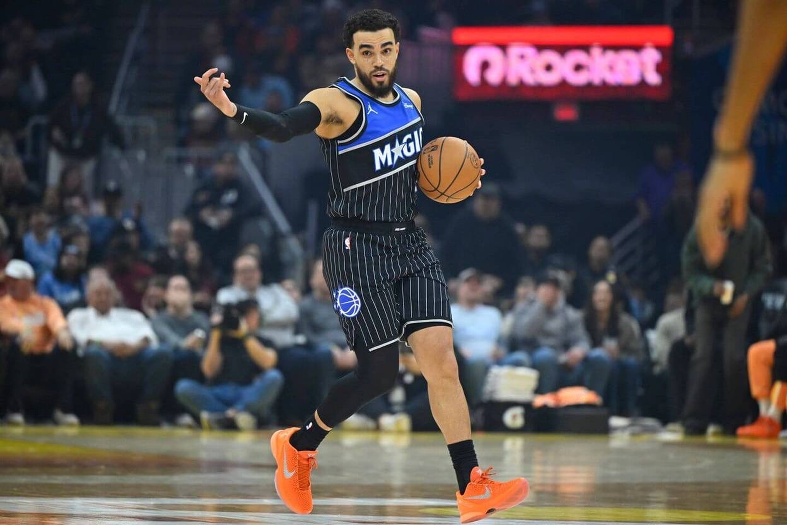 Jan 26, 2026; Cleveland, Ohio, USA; Orlando Magic guard Tyus Jones (2) brings the ball up court in the first quarter against the Cleveland Cavaliers at Rocket Arena. Mandatory Credit: David Richard-Imagn Images