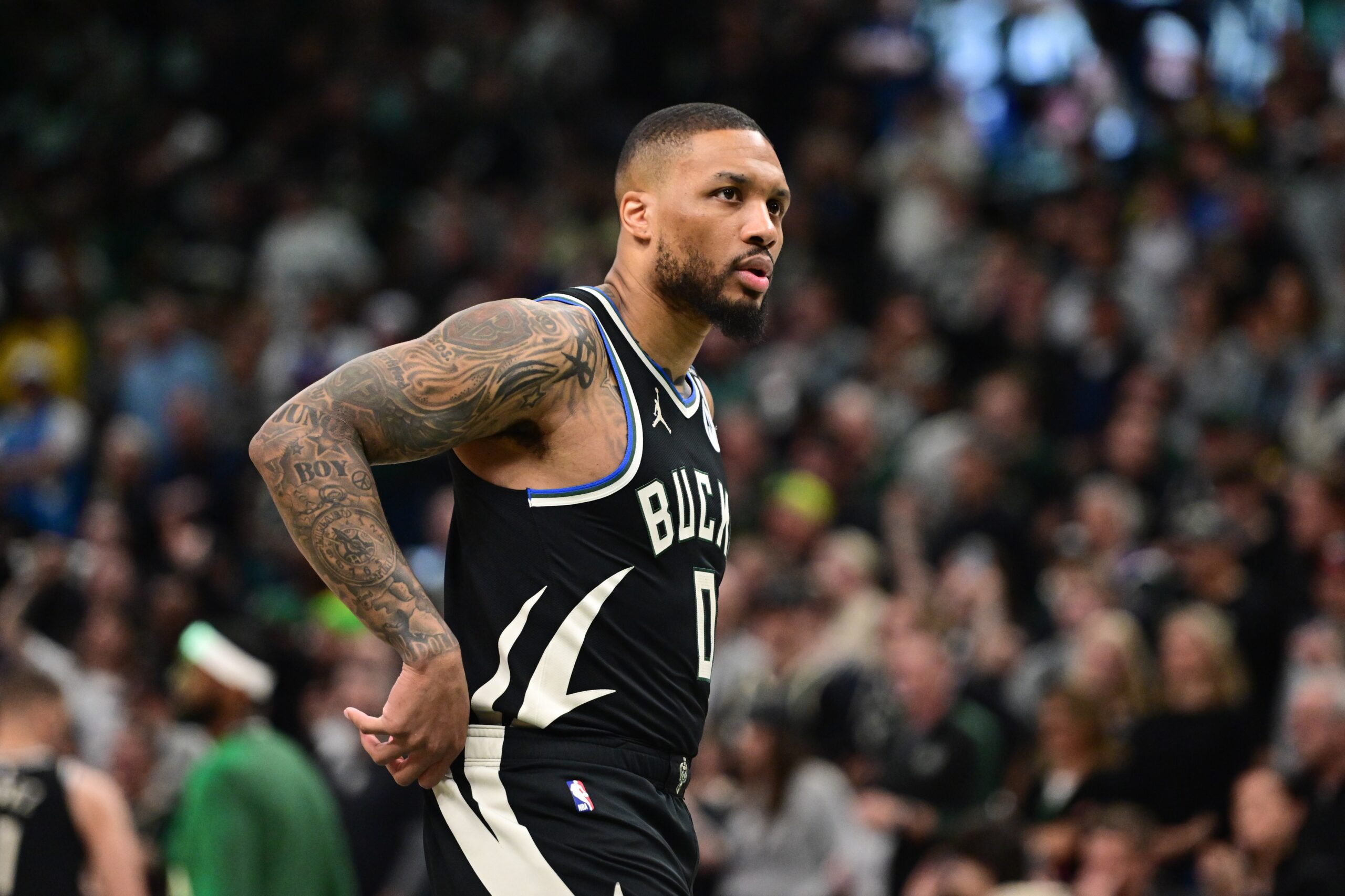 Apr 27, 2025; Milwaukee, Wisconsin, USA; Milwaukee Bucks guard Damian Lillard (0) looks on in the first quarter during game four against the Indiana Pacers of first round for the 2024 NBA Playoffs at Fiserv Forum. Lillard left the game early in the in the first quarter with an injury. Mandatory Credit: Benny Sieu-Imagn Images