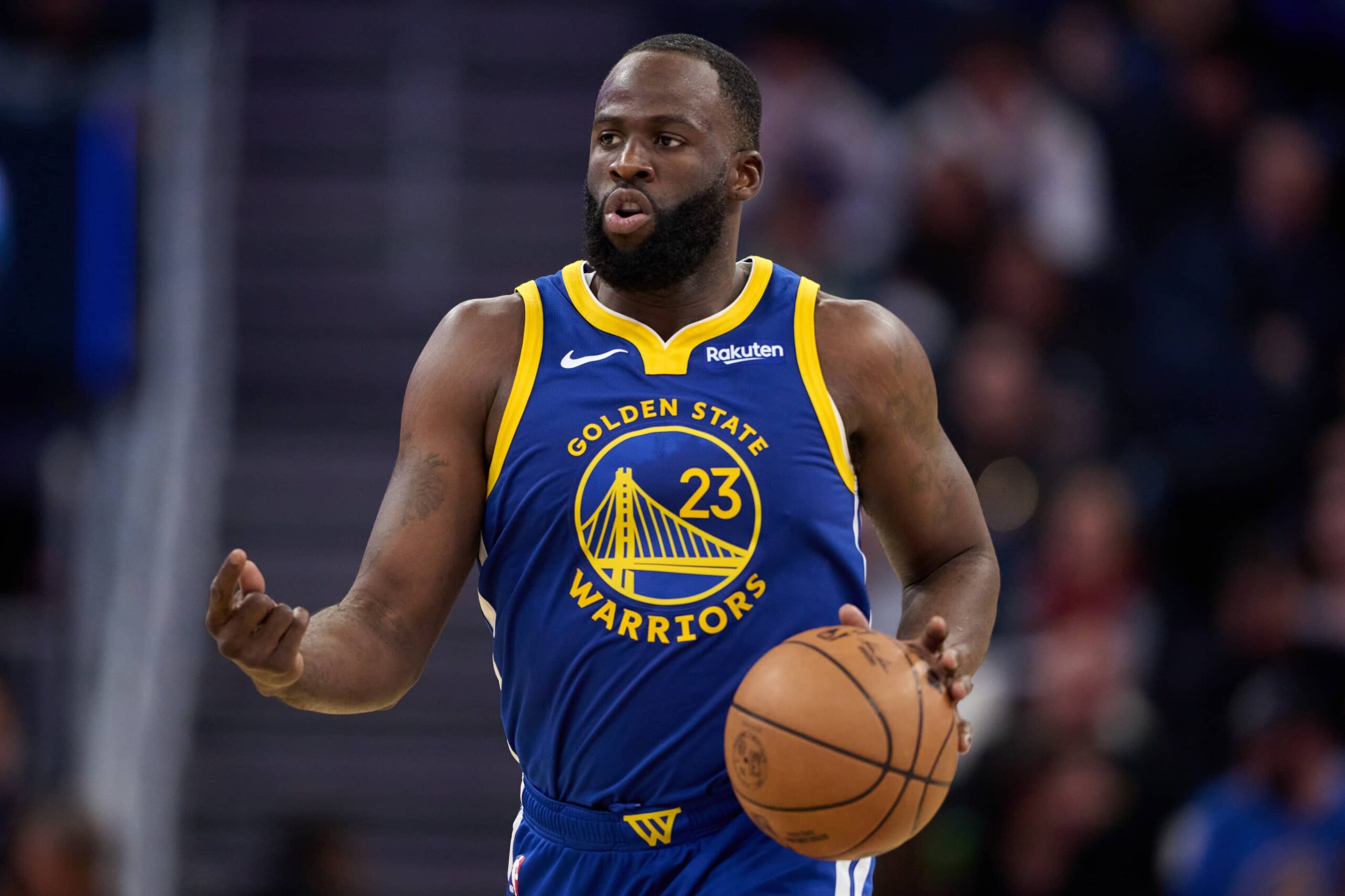 San Francisco, California, USA; Golden State Warriors forward Draymond Green (23) brings the ball up court against the Milwaukee Bucks during the third quarter at Chase Center. Mandatory Credit: Robert Edwards-Imagn Images