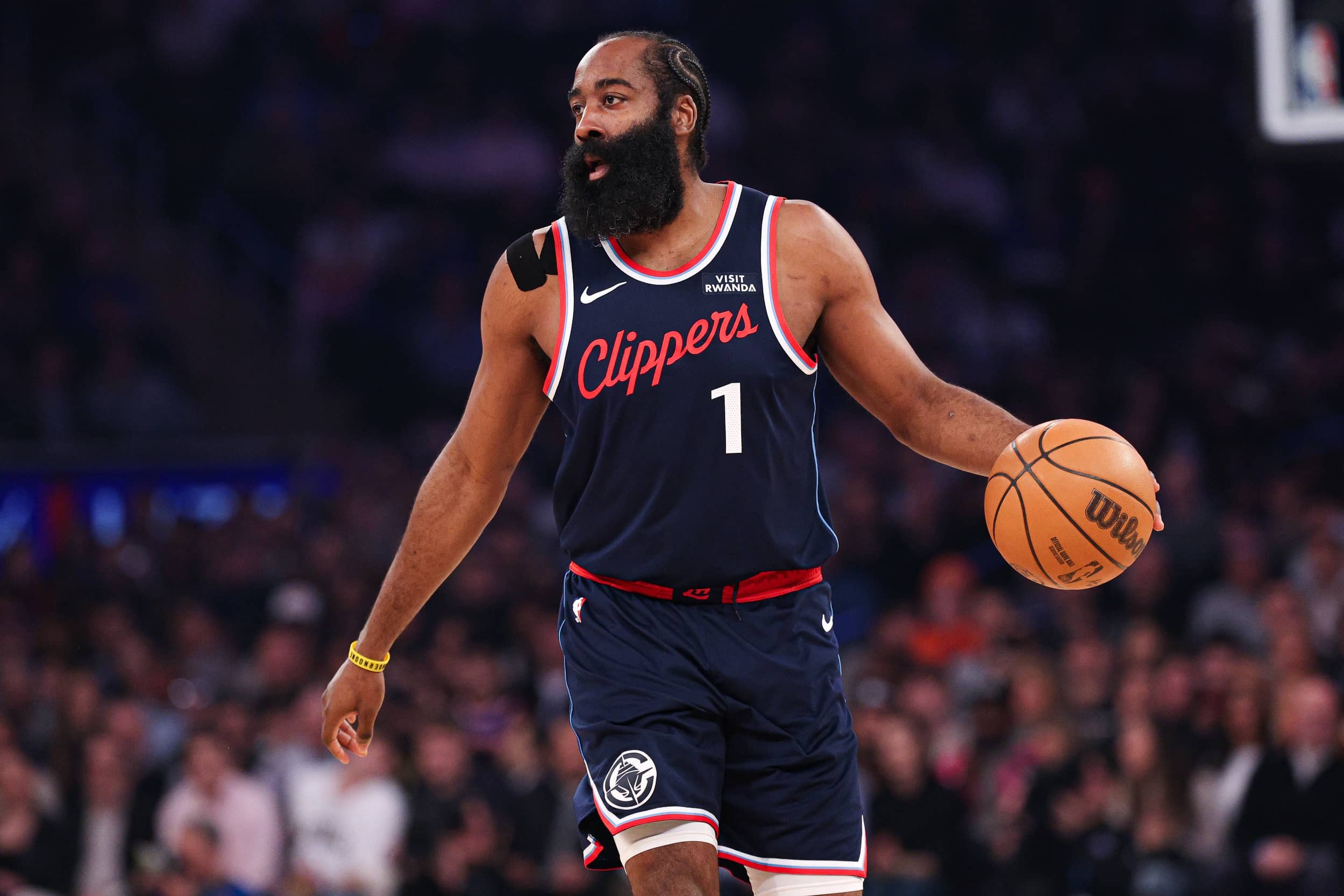 New York, New York, USA; LA Clippers guard James Harden (1) dribbles up court against the New York Knicks during the first quarter at Madison Square Garden. Mandatory Credit: Vincent Carchietta-Imagn Images