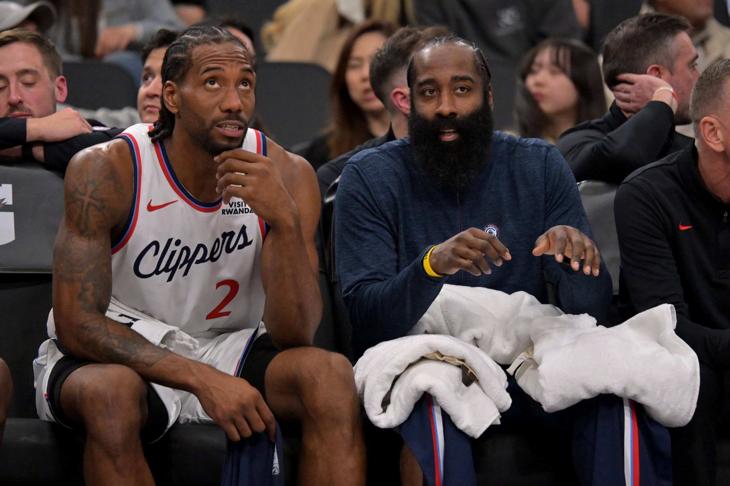Inglewood, California, USA; Los Angeles Clippers forward Kawhi Leonard (2)and Los Angeles Clippers guard James Harden (1) sit on the bench in the fourth quarter against the Sacramento Kings at Intuit Dome. Mandatory Credit: Jayne Kamin-Oncea-Imagn Images