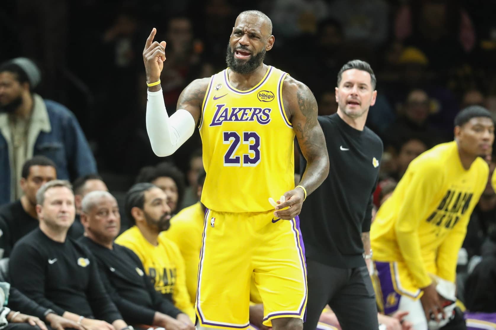 Los Angeles Lakers forward LeBron James (23) signals for a video review in the third quarter against the Brooklyn Nets