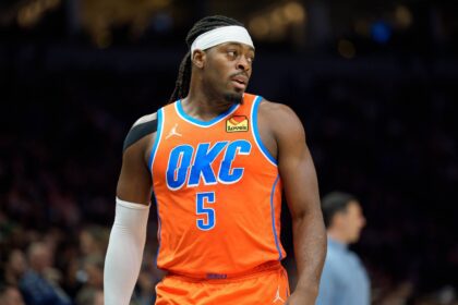 Minneapolis, Minnesota, USA; Oklahoma City Thunder guard Lu Dort (5) during a break in the action against the Minnesota Timberwolves in the third quarter at Target Center. Mandatory Credit: Matt Blewett-Imagn Images