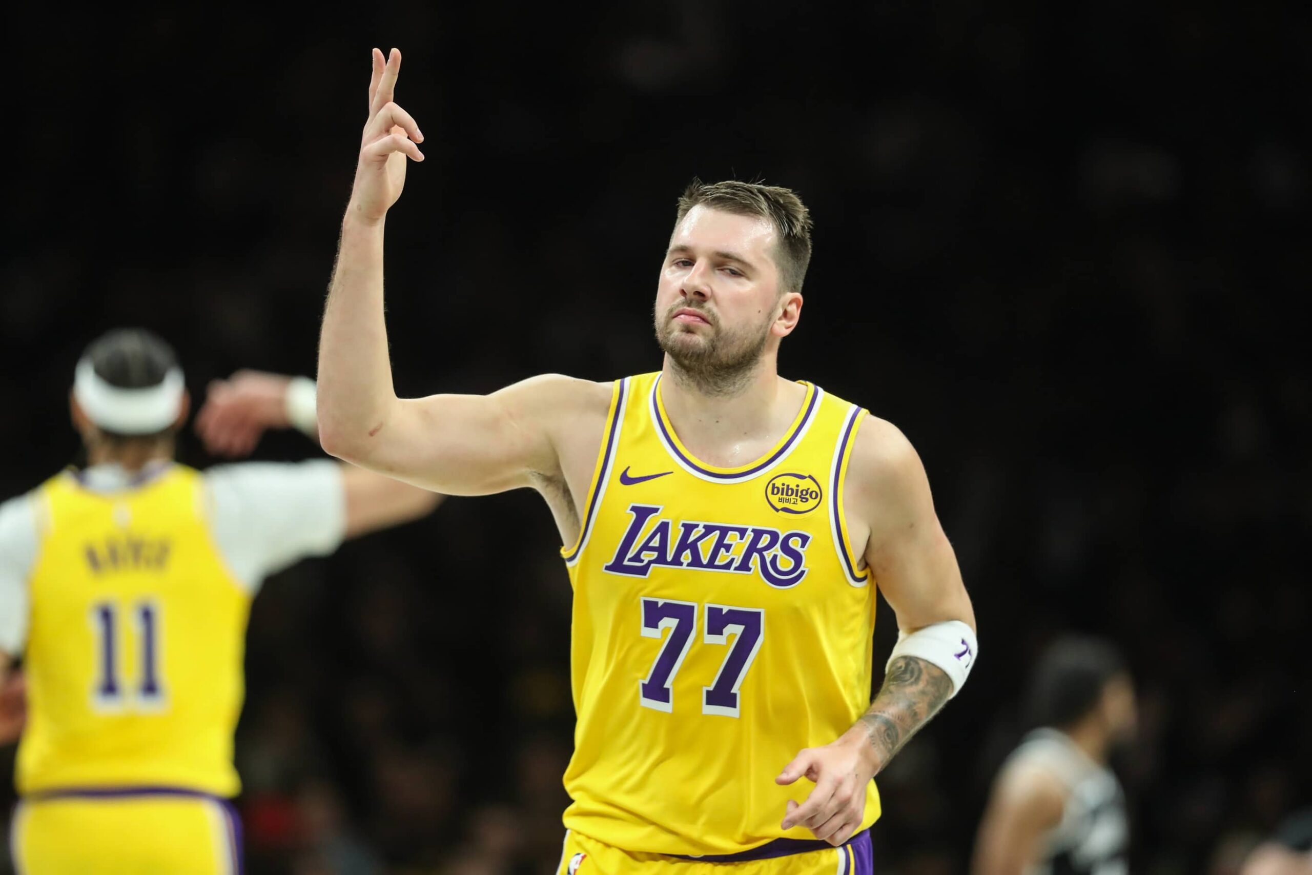 Brooklyn, New York, USA; Los Angeles Lakers guard Luka Doncic (77) gestures after scoring in the first quarter against the Brooklyn Nets at Barclays Center. Mandatory Credit: Wendell Cruz-Imagn Images
