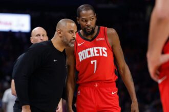 Houston Rockets head coach Ime Udoka talks to forward Kevin Durant (7) during a break in play against the Oklahoma City Thunder during the second half at Paycom Center. Mandatory Credit: Alonzo Adams-Imagn Images