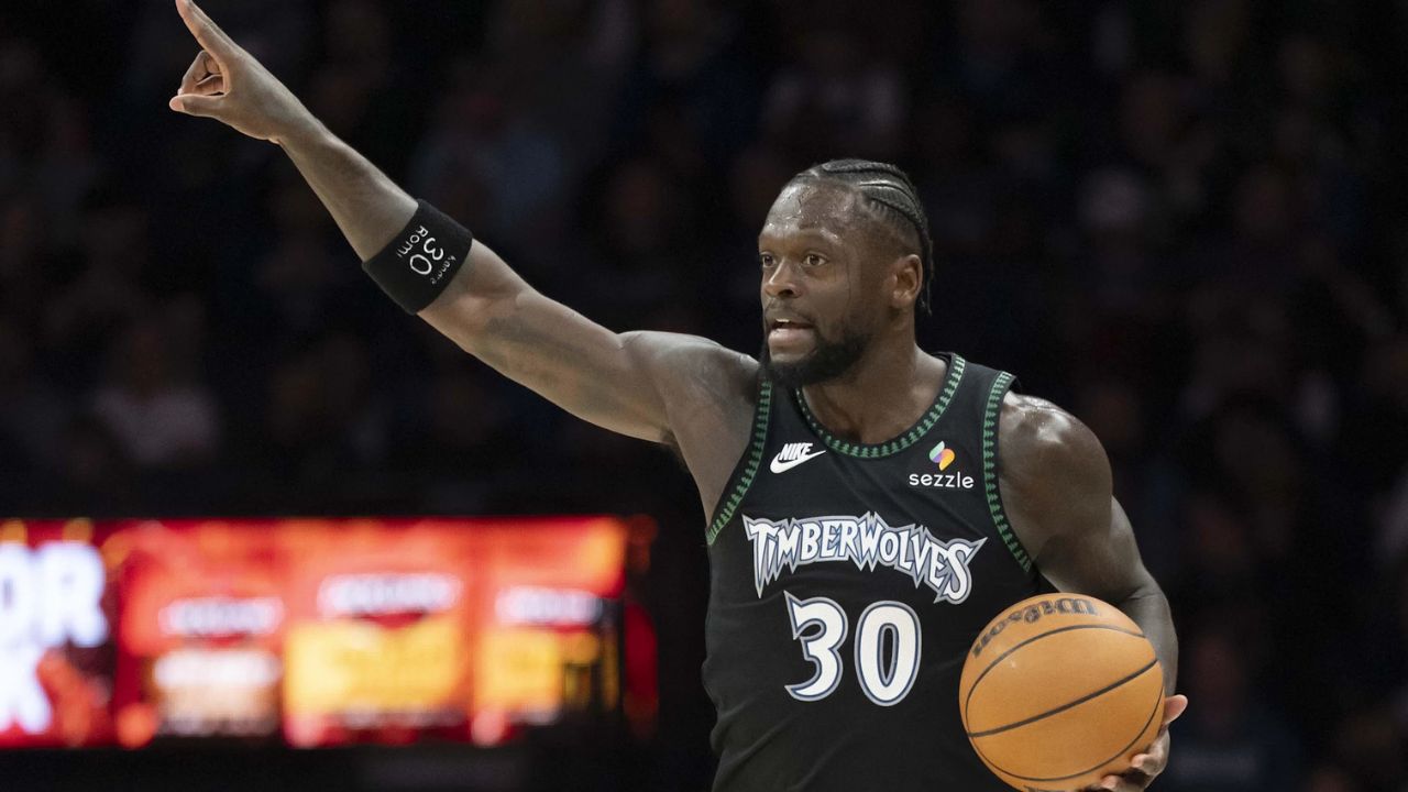 Mar 5, 2026; Minneapolis, Minnesota, USA; Minnesota Timberwolves forward Julius Randle (30) dribbles the bal against the Toronto Raptors in the first half at Target Center. Mandatory Credit: Jesse Johnson-Imagn Images