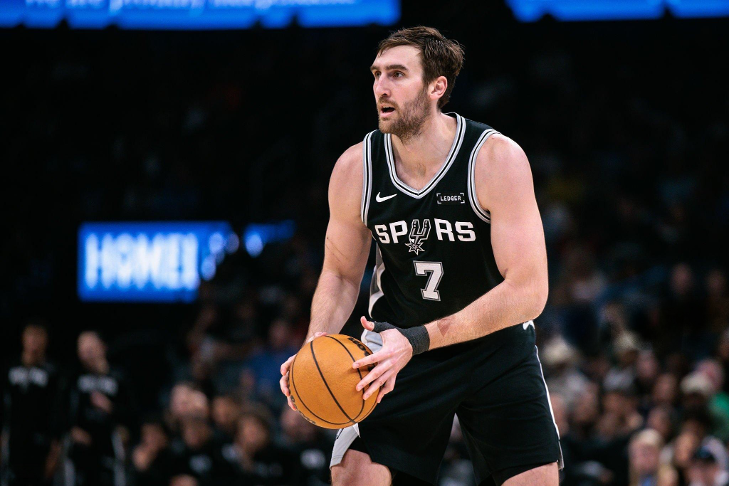 OKLAHOMA CITY, OKLAHOMA - DECEMBER 25: Luke Kornet #7 of the San Antonio Spurs brings the ball up court during the second half against the Oklahoma City Thunder at Paycom Center on December 25, 2025 in Oklahoma City, Oklahoma. NOTE TO USER: User expressly acknowledges and agrees that, by downloading and or using this photograph, User is consenting to the terms and conditions of the Getty Images License Agreement.