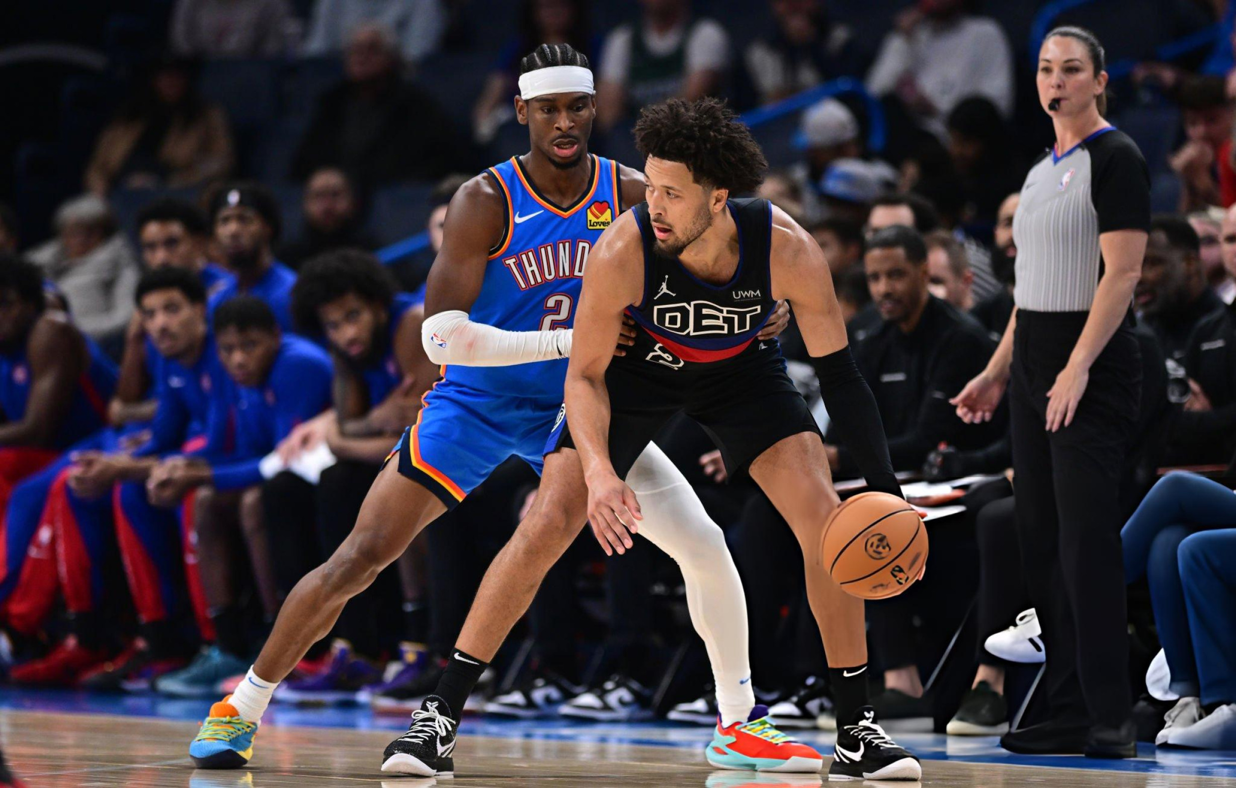 OKLAHOMA CITY, OKLAHOMA - OCTOBER 30: Cade Cunningham #2 of the Detroit Pistons handles the ball while being defended by Shai Gilgeous-Alexander #2 of the Oklahoma City Thunder at Paycom Center on October 30, 2023 in Oklahoma City, Oklahoma. (Photo by Joshua Gateley/Getty Images)
