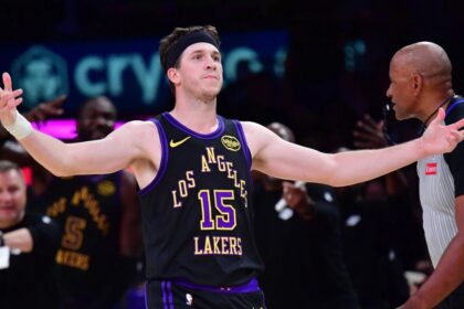Mar 10, 2026; Los Angeles, California, USA; Los Angeles Lakers guard Austin Reaves (15) reacts after scoring the three point basket and draws the foul against the Minnesota Timberwolves during the second half at Crypto.com Arena. Mandatory Credit: Gary A. Vasquez-Imagn Images