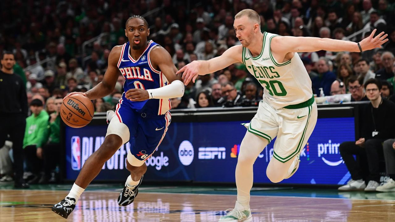 Apr 19, 2026; Boston, Massachusetts, USA; Philadelphia 76ers guard Tyrese Maxey (0) controls the ball while Boston Celtics forward Sam Hauser (30) defends in the first half during game one of the first round of the 2026 NBA Playoffs at TD Garden. Mandatory Credit: Bob DeChiara-Imagn Images
