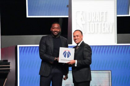 Mark Tatum the NBA Deputy Commissioner and Washington Wizard (left) guard John Wall pose for photos after Wizards won the 2026 NBA Draft Lottery at Navy Pier.