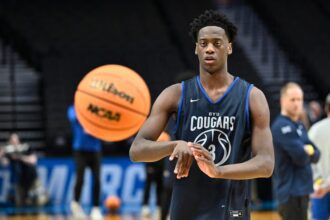 Mar 18, 2026; Portland, OR, USA; BYU Cougars forward AJ Dybantsa (3) passes the ball during a practice session ahead of the first round of the men's 2026 NCAA Tournament at Moda Center. Mandatory Credit: Craig Strobeck-Imagn Images