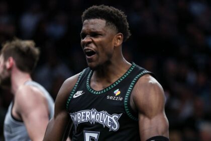 Nov 30, 2025; Minneapolis, Minnesota, USA; Minnesota Timberwolves guard Anthony Edwards (5) celebrates his basket against the San Antonio Spurs during the second half at Target Center. Mandatory Credit: Matt Krohn-Imagn Images