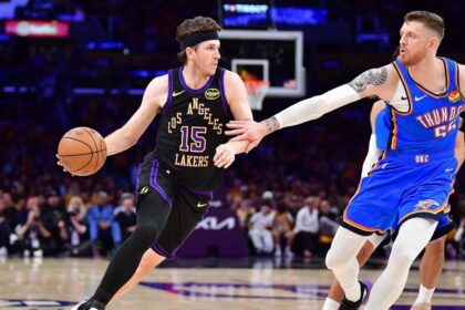 May 11, 2026; Los Angeles, California, USA; Los Angeles Lakers guard Austin Reaves (15) moves the ball against Oklahoma City Thunder center Isaiah Hartenstein (55) during the first half in game four of the second round of the 2026 NBA Playoffs at Crypto.com Arena. Mandatory Credit: Gary A. Vasquez-Imagn Images