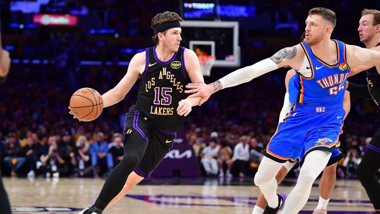 May 11, 2026; Los Angeles, California, USA; Los Angeles Lakers guard Austin Reaves (15) moves the ball against Oklahoma City Thunder center Isaiah Hartenstein (55) during the first half in game four of the second round of the 2026 NBA Playoffs at Crypto.com Arena. Mandatory Credit: Gary A. Vasquez-Imagn Images