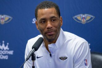 Bulls EVP Bryson Graham speaks with the media during a press conference. Mandatory Credit: Matthew Hinton - Imagn Images