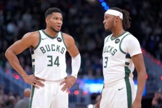 MILWAUKEE, WISCONSIN - NOVEMBER 09: Giannis Antetokounmpo #34 and Myles Turner #3 of the Milwaukee Bucks talk with each other during the game against the Houston Rockets at Fiserv Forum on November 09, 2025 in Milwaukee, Wisconsin. (Photo by John Fisher/Getty Images)