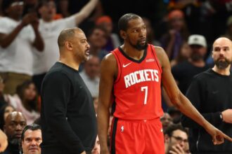 Apr 7, 2026; Phoenix, Arizona, USA; Houston Rockets head coach Ime Udoka with forward Kevin Durant (7) against the Phoenix Suns at Mortgage Matchup Center. Mandatory Credit: Mark J. Rebilas-Imagn Images