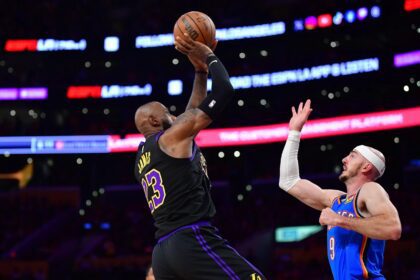 May 11, 2026; Los Angeles, California, USA; Los Angeles Lakers forward LeBron James (23) shoots against Oklahoma City Thunder guard Alex Caruso (9) during the first half in game four of the second round of the 2026 NBA Playoffs at Crypto.com Arena. Mandatory Credit: Gary A. Vasquez-Imagn Images