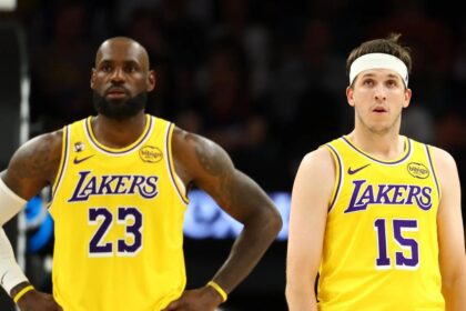 Feb 26, 2026; Phoenix, Arizona, USA; Los Angeles Lakers guard Austin Reaves (15) with forward LeBron James (23) against the Phoenix Suns at Mortgage Matchup Center. Mandatory Credit: Mark J. Rebilas-Imagn Images