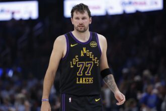 Apr 2, 2026; Oklahoma City, Oklahoma, USA; Los Angeles Lakers guard Luka Doncic (77) stands on the court during the second half against the Oklahoma City Thunder at Paycom Center. Mandatory Credit: Alonzo Adams-Imagn Images
