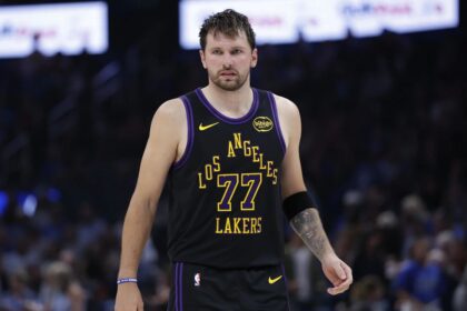 Apr 2, 2026; Oklahoma City, Oklahoma, USA; Los Angeles Lakers guard Luka Doncic (77) stands on the court during the second half against the Oklahoma City Thunder at Paycom Center. Mandatory Credit: Alonzo Adams-Imagn Images
