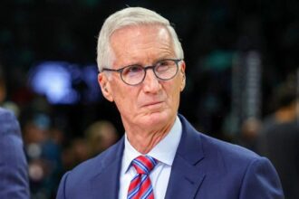 MINNEAPOLIS, MINNESOTA - APRIL 25: NBA on ESPN play-by-play commentator Mike Breen looks on prior to the start of Game Four of the First Round of the 2026 NBA Western Conference Playoffs between the Denver Nuggets and Minnesota Timberwolves at Target Center on April 25, 2026 in Minneapolis, Minnesota. The Timberwolves defeated the Nuggets 112-96. (Photo by David Berding/Getty Images)