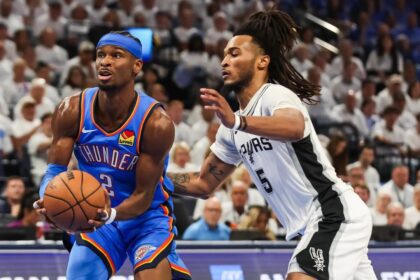 May 20, 2026; Oklahoma City, Oklahoma, USA; Oklahoma City Thunder guard Shai Gilgeous-Alexander (2) drives to the basket as San Antonio Spurs guard Stephon Castle (5) defends during the third quarter during game two of the western conference finals for the 2026 NBA playoffs at Paycom Center. Mandatory Credit: Brett Rojo-Imagn Images