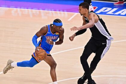 OKLAHOMA CITY, OKLAHOMA - MAY 18: Shai Gilgeous-Alexander #2 of the Oklahoma City Thunder drives to the basket against Victor Wembanyama #1 of the San Antonio Spurs during the first quarter in Game One of the NBA Western Conference Finals at Paycom Center on May 18, 2026 in Oklahoma City, Oklahoma. (Photo by Joshua Gateley/Getty Images)