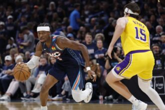 May 7, 2026; Oklahoma City, Oklahoma, USA; Oklahoma City Thunder guard Shai Gilgeous-Alexander (2) drives down the court against Los Angeles Lakers guard Austin Reaves (15) in the second half during game two of the second round of the 2026 NBA Playoffs at Paycom Center. Mandatory Credit: Alonzo Adams-Imagn Images