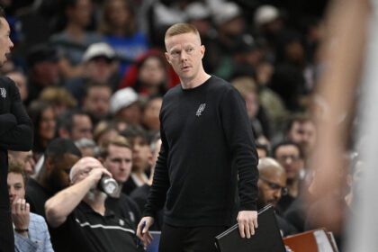 San Antonio Spurs associate coach Sean Sweeney looks on during the second half against the Dallas Mavericks at the American Airlines Center.