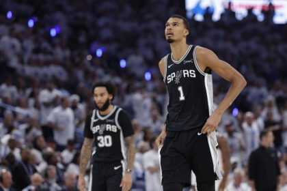 San Antonio Spurs forward Victor Wembanyama (1) reacts after a play during the third quarter against the Oklahoma City Thunder in game five of the western conference finals for the 2026 NBA playoffs at Paycom Center.