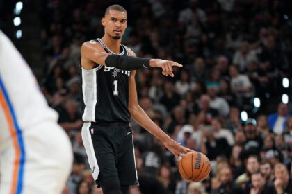 San Antonio Spurs forward Victor Wembanyama (1) dribbles the ball against the Oklahoma City Thunder in the first half during game six of the western conference finals for the 2026 NBA playoffs at Frost Bank Center.
