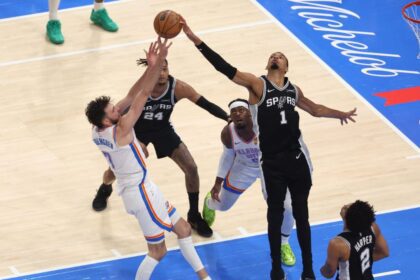 May 26, 2026; Oklahoma City, Oklahoma, USA; San Antonio Spurs forward Victor Wembanyama (1) blocksOklahoma City Thunder center Chet Holmgren (7) during the second quarter in game five of the western conference finals for the 2026 NBA playoffs at Paycom Center. Mandatory Credit: Brett Rojo-Imagn Images