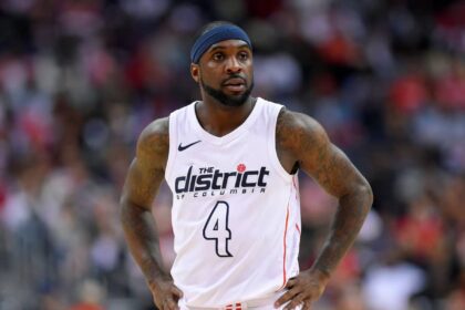 Washington Wizards guard Ty Lawson (4) looks on during the second half of Game 4 of an NBA basketball first-round playoff series against the Toronto Raptors, in Washington. Less than three weeks ago, Lawson was playing professional basketball in China. Nowadays, he's been one of the first subs off the bench for the Washington Wizards in their Eastern Conference first-round playoff series against the No. 1 seed Toronto Raptors (AP Photo/Nick Wass, File)