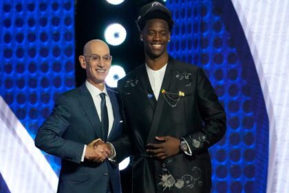 BROOKLYN, NY - JUNE 23: NBA Commissioner, Adam Silver poses for a photo with AJ Dybantsa after being drafted number one overall by Washington Wizards during the 2026 NBA Draft - Round One on June 23, 2026 at Barclays Center in Brooklyn, New York.