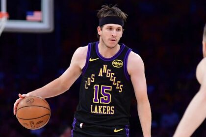 May 11, 2026; Los Angeles, California, USA; Los Angeles Lakers guard Austin Reaves (15) moves the ball against Oklahoma City Thunder center Isaiah Hartenstein (55) during the first half in game four of the second round of the 2026 NBA Playoffs at Crypto.com Arena. Mandatory Credit: Gary A. Vasquez-Imagn Images