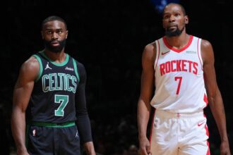 Houston Rockets v Boston Celtics BOSTON, MA - NOVEMBER 1: Jaylen Brown #7 of the Boston Celtics and Kevin Durant #7 of the Houston Rockets looks on during the game on November 1, 2025 at TD Garden in Boston, Massachusetts. (Photo by Brian Babineau/NBAE via Getty Images)
