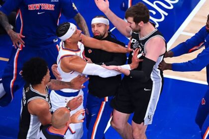 Jun 8, 2026; New York, New York, USA; New York Knicks guard Josh Hart (3) pushes San Antonio Spurs center Luke Kornet (7) after the whistle during game three of the 2026 NBA Finals in the first quarter at Madison Square Garden. Mandatory Credit: Wendell Cruz-Imagn Images