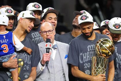 SAN ANTONIO, TEXAS - JUNE 13: Ernie Johnson Jr. interviews Josh Hart #3 and Mikal Bridges #25 of the New York Knicks after the victory against the San Antonio Spurs in Game Five of the 2026 NBA Finals at Frost Bank Center on June 13, 2026 in San Antonio, Texas. (Photo by Gregory Shamus/Getty Images)