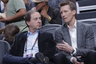 SACRAMENTO, CA - NOVEMBER 28: Majority owner Joe Lacob and General Manager Mike Dunleavy Jr. of the Golden State Warriors talk during the game between the Golden State Warriors and Sacramento Kings during the In-Season Tournament on November 28, 2023 at Golden 1 Center in Sacramento, California. (Photo by Rocky Widner/NBAE via Getty Images)