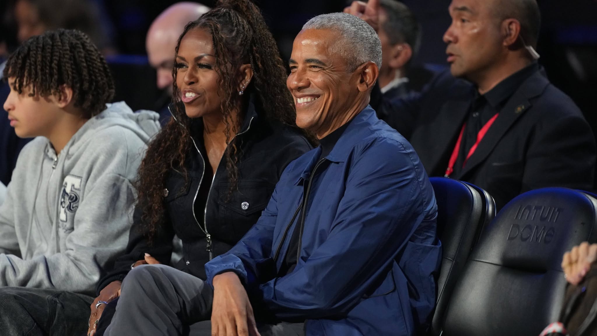 Feb 15, 2026; Inglewood, California, USA; Former first lady Michelle Obama and former President Barack Obama look on before the start of the 75th NBA All Star Game at Intuit Dome. Mandatory Credit: Kirby Lee-Imagn Images