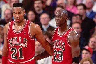 PORTLAND, OR - 1991: Stacey King #21 and Michael Jordan #23 of the Chicago Bulls talk during the game against the Portland Trailblazers played at the Veterans Memorial Coliseum in Portland, Oregon circa 1991. (Photo by Brian Drake/NBAE via Getty Images)