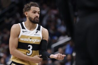 Mar 5, 2026; Washington, District of Columbia, USA; Washington Wizards guard Trae Young (3) stands on the court against the Utah Jazz in the second half at Capital One Arena. Mandatory Credit: Geoff Burke-Imagn Images