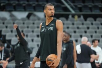 Jun 2, 2026; San Antonio, TX, USA; San Antonio Spurs forward Victor Wembanyama (1) looks over during practice on media day for the 2026 NBA Finals at Frost Bank Center. Mandatory Credit: Daniel Dunn-Imagn Images