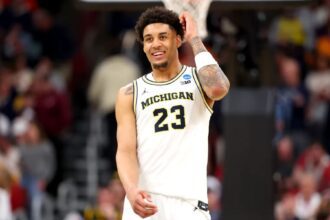 Yaxel Lendeborg reacts to a play during a Michigan game. Mandatory Credit: Gregory Shamus - Getty Images