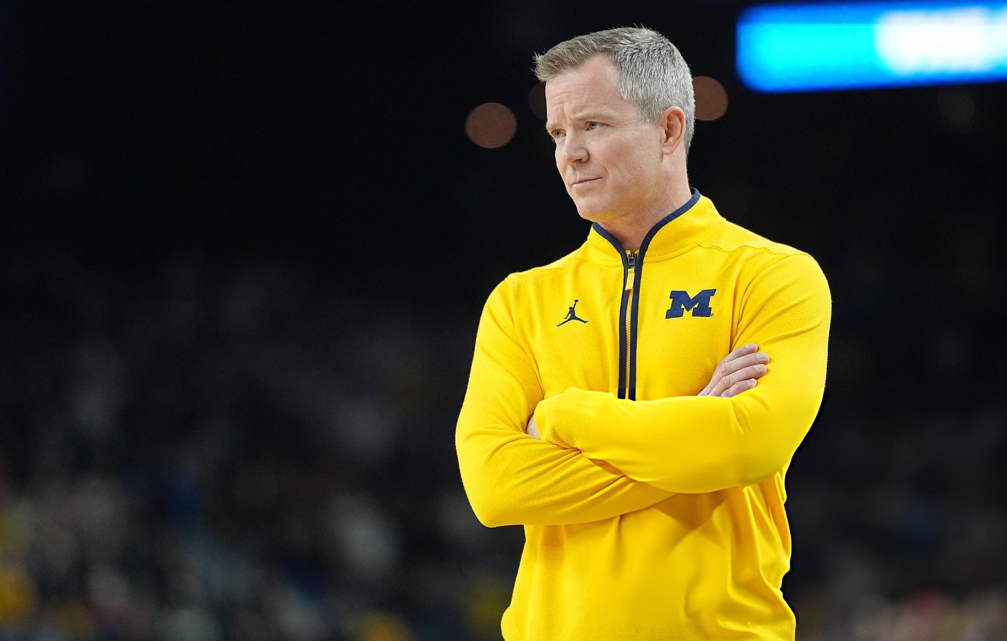 College Basketball: NCAA Finals: Michigan Head Coach Dusty May looks on from the sideline vs UConn at Lucas Oil Stadium. Indianapolis, IN